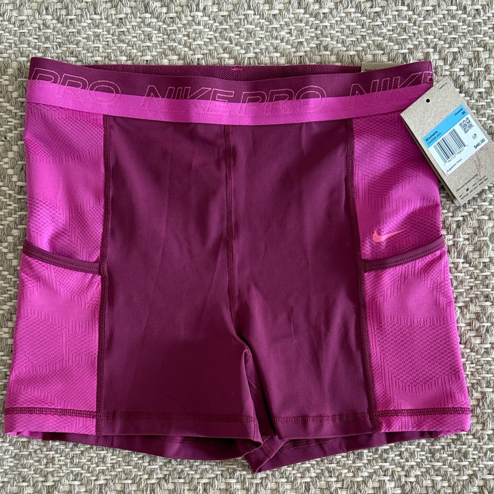 New with Tags Nike Pro Magenta and Plum Bike Shorts 3”. Size Medium